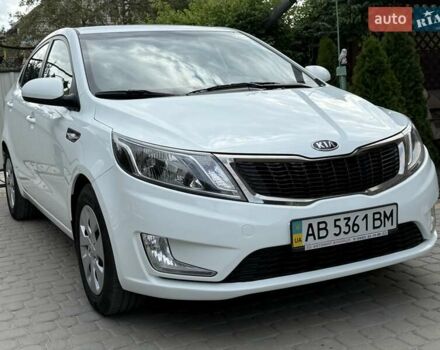 Білий Кіа Ріо, об'ємом двигуна 1.6 л та пробігом 82 тис. км за 9600 $, фото 5 на Automoto.ua