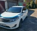 Білий Кіа Ріо, об'ємом двигуна 1.4 л та пробігом 69 тис. км за 8999 $, фото 3 на Automoto.ua