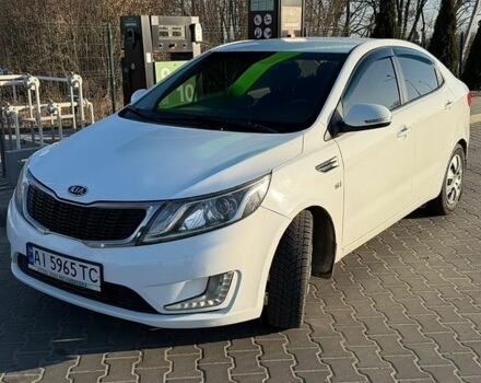 Білий Кіа Ріо, об'ємом двигуна 1.6 л та пробігом 235 тис. км за 7600 $, фото 1 на Automoto.ua