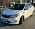 Білий Кіа Ріо, об'ємом двигуна 1.6 л та пробігом 235 тис. км за 7600 $, фото 1 на Automoto.ua