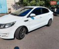Білий Кіа Ріо, об'ємом двигуна 1.6 л та пробігом 206 тис. км за 6600 $, фото 1 на Automoto.ua