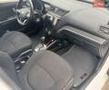 Білий Кіа Ріо, об'ємом двигуна 1.4 л та пробігом 230 тис. км за 5300 $, фото 16 на Automoto.ua