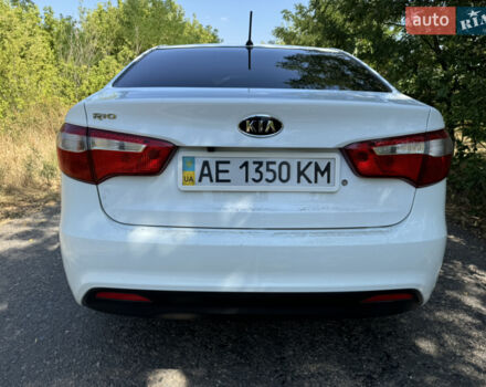 Білий Кіа Ріо, об'ємом двигуна 1.4 л та пробігом 96 тис. км за 8555 $, фото 10 на Automoto.ua
