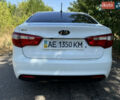 Білий Кіа Ріо, об'ємом двигуна 1.4 л та пробігом 96 тис. км за 8555 $, фото 10 на Automoto.ua