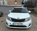 Белый Киа Рио, объемом двигателя 1.4 л и пробегом 315 тыс. км за 4999 $, фото 1 на Automoto.ua