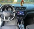 Білий Кіа Ріо, об'ємом двигуна 1.4 л та пробігом 149 тис. км за 9500 $, фото 16 на Automoto.ua