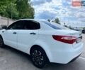Белый Киа Рио, объемом двигателя 1.4 л и пробегом 220 тыс. км за 6900 $, фото 2 на Automoto.ua