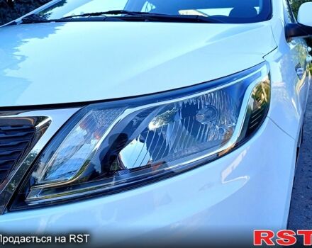 Білий Кіа Ріо, об'ємом двигуна 1.4 л та пробігом 52 тис. км за 8900 $, фото 13 на Automoto.ua