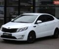 Білий Кіа Ріо, об'ємом двигуна 1.6 л та пробігом 127 тис. км за 8600 $, фото 1 на Automoto.ua