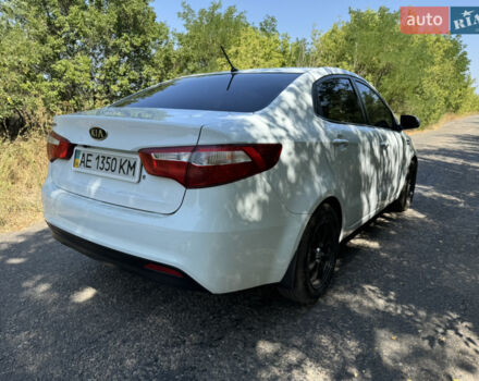 Білий Кіа Ріо, об'ємом двигуна 1.4 л та пробігом 96 тис. км за 8555 $, фото 11 на Automoto.ua