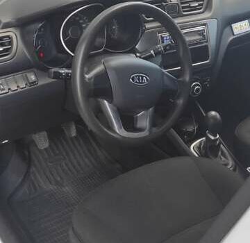 Белый Киа Рио, объемом двигателя 1.4 л и пробегом 168 тыс. км за 6800 $, фото 8 на Automoto.ua