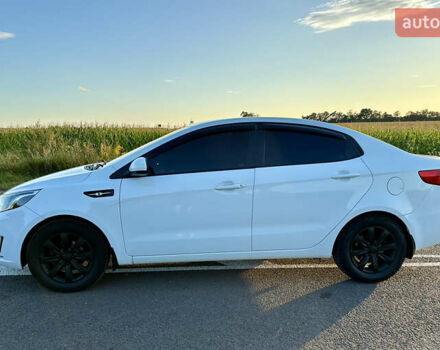 Білий Кіа Ріо, об'ємом двигуна 1.4 л та пробігом 142 тис. км за 6200 $, фото 9 на Automoto.ua
