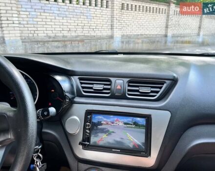 Белый Киа Рио, объемом двигателя 1.4 л и пробегом 220 тыс. км за 6900 $, фото 9 на Automoto.ua
