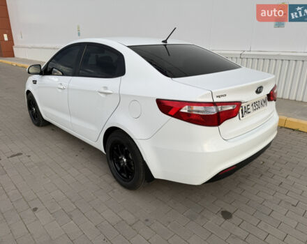 Білий Кіа Ріо, об'ємом двигуна 1.4 л та пробігом 96 тис. км за 8555 $, фото 19 на Automoto.ua