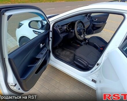 Білий Кіа Ріо, об'ємом двигуна 1.4 л та пробігом 99 тис. км за 6500 $, фото 11 на Automoto.ua