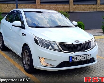 Білий Кіа Ріо, об'ємом двигуна 1.4 л та пробігом 99 тис. км за 6500 $, фото 2 на Automoto.ua