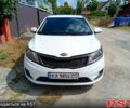 Білий Кіа Ріо, об'ємом двигуна 1.4 л та пробігом 213 тис. км за 7800 $, фото 1 на Automoto.ua