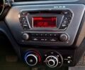 Білий Кіа Ріо, об'ємом двигуна 1.4 л та пробігом 87 тис. км за 8750 $, фото 7 на Automoto.ua