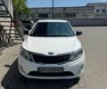 Білий Кіа Ріо, об'ємом двигуна 1.4 л та пробігом 221 тис. км за 5999 $, фото 1 на Automoto.ua