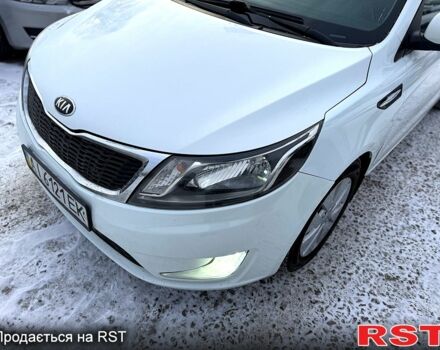 Білий Кіа Ріо, об'ємом двигуна 1.6 л та пробігом 14800 тис. км за 7800 $, фото 4 на Automoto.ua