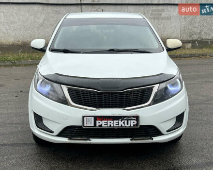Белый Киа Рио, объемом двигателя 1.4 л и пробегом 246 тыс. км за 6550 $, фото 1 на Automoto.ua
