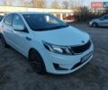 Білий Кіа Ріо, об'ємом двигуна 1.4 л та пробігом 139 тис. км за 7000 $, фото 13 на Automoto.ua