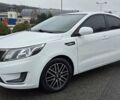 Білий Кіа Ріо, об'ємом двигуна 1.4 л та пробігом 124 тис. км за 7199 $, фото 2 на Automoto.ua