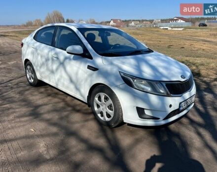 Білий Кіа Ріо, об'ємом двигуна 1.4 л та пробігом 210 тис. км за 5800 $, фото 1 на Automoto.ua