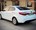 Белый Киа Рио, объемом двигателя 1.4 л и пробегом 73 тыс. км за 7950 $, фото 1 на Automoto.ua