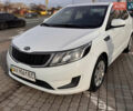 Белый Киа Рио, объемом двигателя 1.4 л и пробегом 169 тыс. км за 6500 $, фото 5 на Automoto.ua