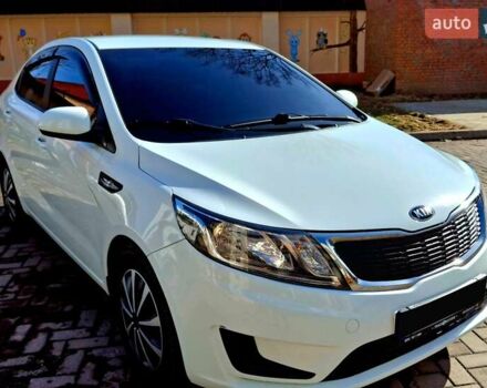 Белый Киа Рио, объемом двигателя 1.4 л и пробегом 87 тыс. км за 8750 $, фото 4 на Automoto.ua