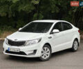 Белый Киа Рио, объемом двигателя 1.4 л и пробегом 208 тыс. км за 5500 $, фото 1 на Automoto.ua