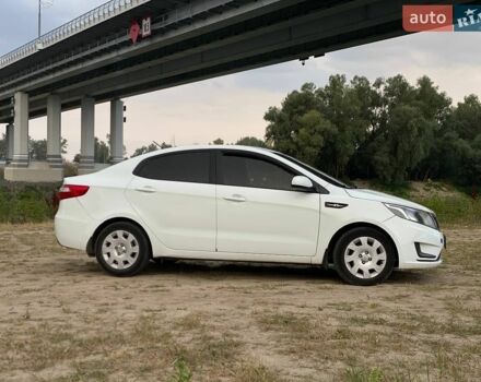 Білий Кіа Ріо, об'ємом двигуна 1.4 л та пробігом 258 тис. км за 6200 $, фото 18 на Automoto.ua