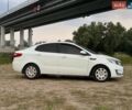 Білий Кіа Ріо, об'ємом двигуна 1.4 л та пробігом 258 тис. км за 6200 $, фото 18 на Automoto.ua