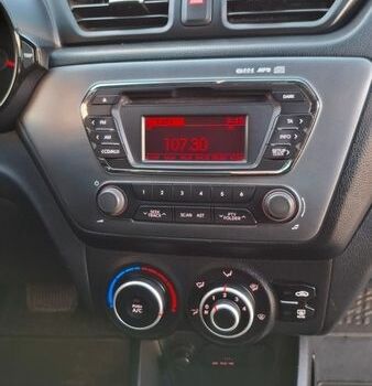 Белый Киа Рио, объемом двигателя 1.4 л и пробегом 87 тыс. км за 8750 $, фото 45 на Automoto.ua