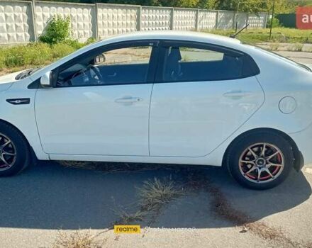 Белый Киа Рио, объемом двигателя 1.4 л и пробегом 83 тыс. км за 10200 $, фото 1 на Automoto.ua