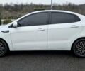 Білий Кіа Ріо, об'ємом двигуна 1.4 л та пробігом 124 тис. км за 7199 $, фото 8 на Automoto.ua