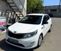 Белый Киа Рио, объемом двигателя 1.4 л и пробегом 222 тыс. км за 6900 $, фото 1 на Automoto.ua