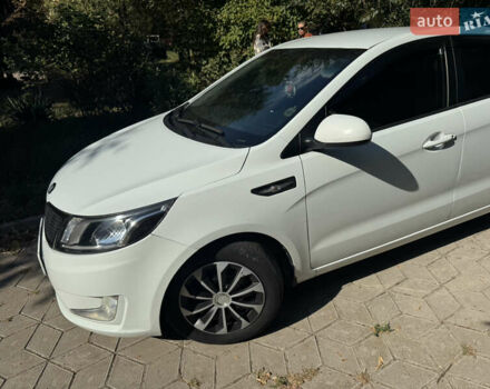 Білий Кіа Ріо, об'ємом двигуна 1.4 л та пробігом 84 тис. км за 9200 $, фото 8 на Automoto.ua