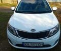 Білий Кіа Ріо, об'ємом двигуна 1.4 л та пробігом 870 тис. км за 7500 $, фото 1 на Automoto.ua