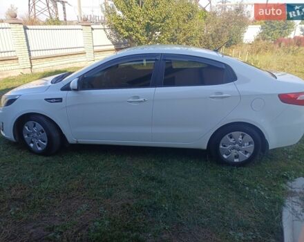 Белый Киа Рио, объемом двигателя 1.4 л и пробегом 82 тыс. км за 8000 $, фото 1 на Automoto.ua