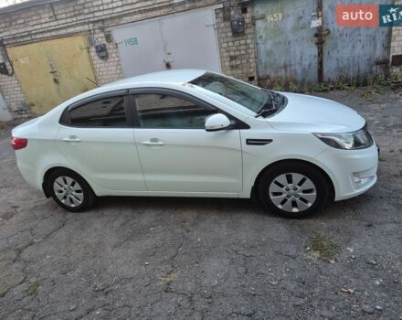 Белый Киа Рио, объемом двигателя 1.6 л и пробегом 156 тыс. км за 8700 $, фото 2 на Automoto.ua