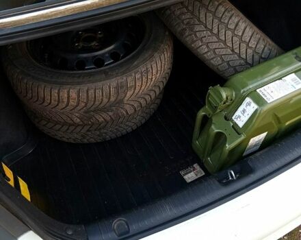 Білий Кіа Ріо, об'ємом двигуна 1.4 л та пробігом 870 тис. км за 7500 $, фото 9 на Automoto.ua