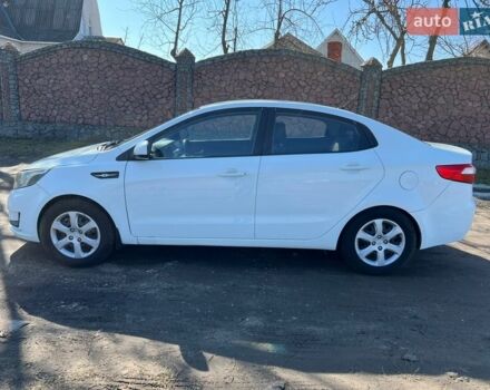 Білий Кіа Ріо, об'ємом двигуна 1.4 л та пробігом 210 тис. км за 5800 $, фото 4 на Automoto.ua