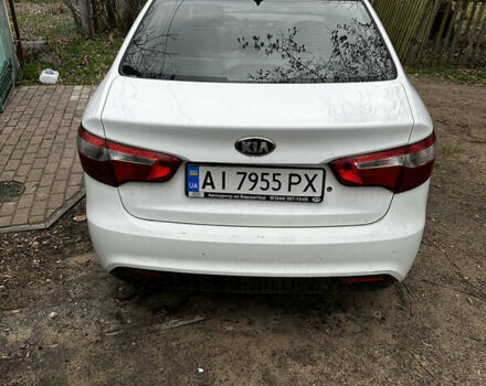 Белый Киа Рио, объемом двигателя 1.4 л и пробегом 207 тыс. км за 6500 $, фото 1 на Automoto.ua