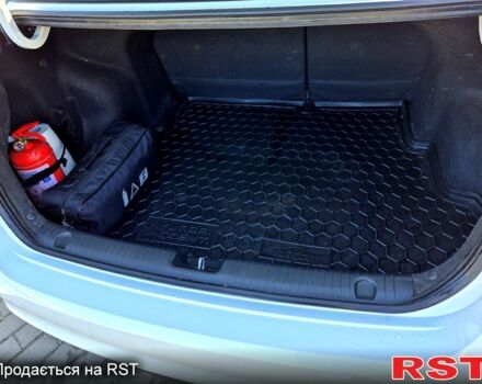 Белый Киа Рио, объемом двигателя 1.4 л и пробегом 176 тыс. км за 8499 $, фото 5 на Automoto.ua