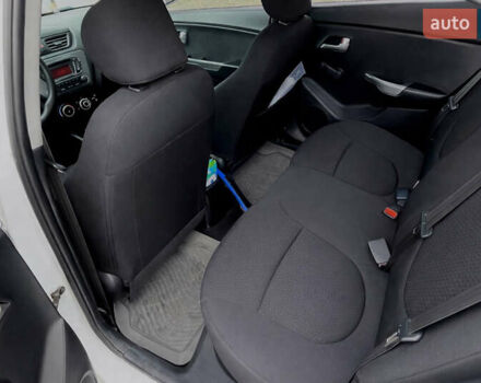 Білий Кіа Ріо, об'ємом двигуна 1.4 л та пробігом 210 тис. км за 6050 $, фото 9 на Automoto.ua