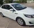 Білий Кіа Ріо, об'ємом двигуна 1.4 л та пробігом 63 тис. км за 9300 $, фото 2 на Automoto.ua