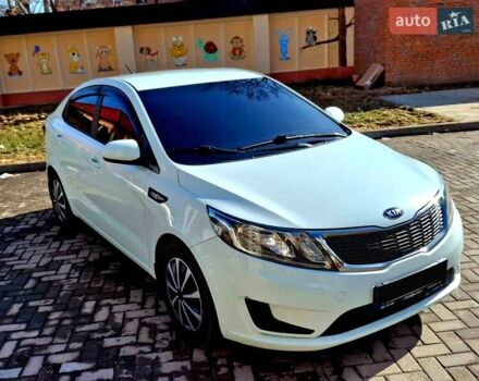 Белый Киа Рио, объемом двигателя 1.4 л и пробегом 87 тыс. км за 8750 $, фото 2 на Automoto.ua
