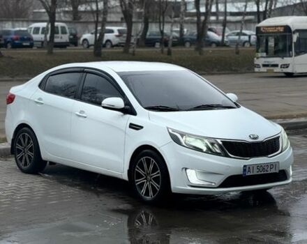 Білий Кіа Ріо, об'ємом двигуна 1.59 л та пробігом 238 тис. км за 6900 $, фото 1 на Automoto.ua